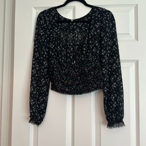 Free people black floral rushed top